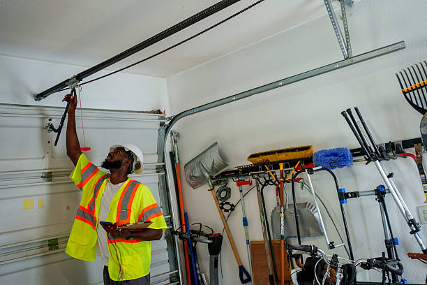 Professional Garage Door Panel Replacement technician working in Trowbridge Park, MI